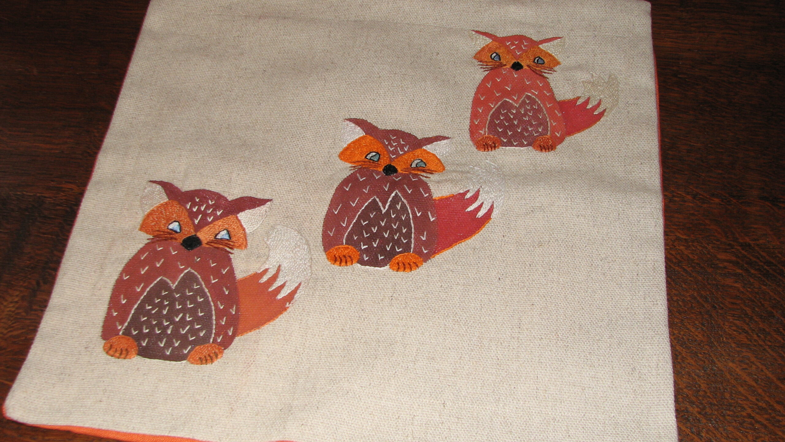 Housse de coussin aux trois renards